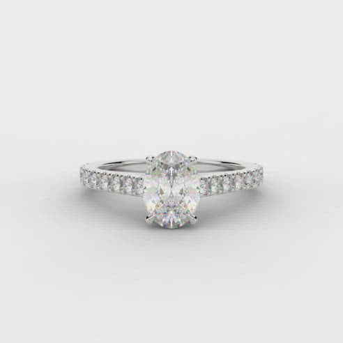 Oval Cut Diamond Solitaire Ring With Diamond Shoulders