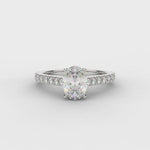 Oval Cut Diamond Solitaire Ring With Diamond Shoulders